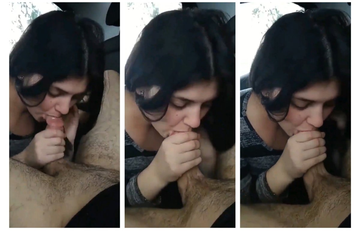 A woman's seductive expression in a car